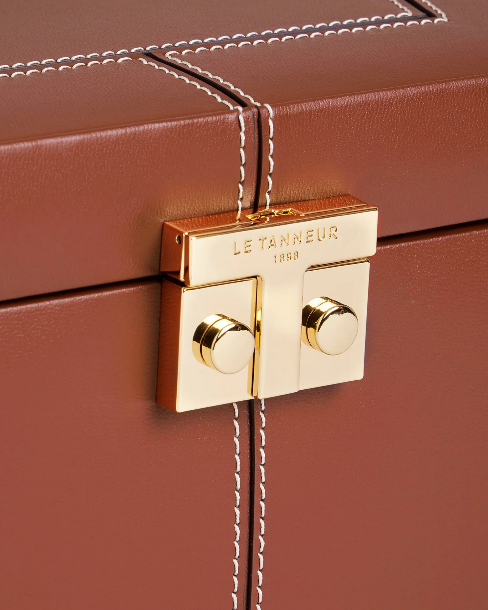 Grande boite à bijoux fermoir T en cuir